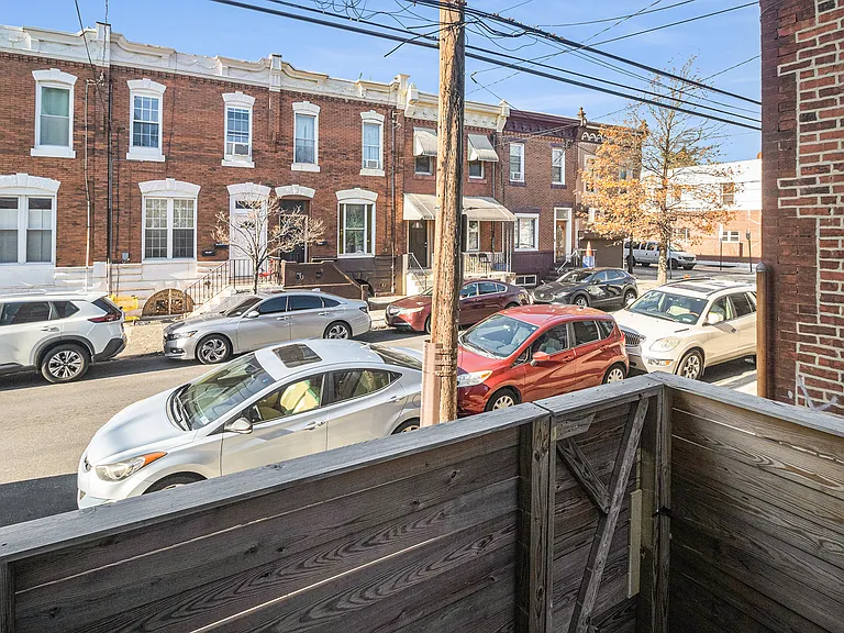 View of street from backyard porch