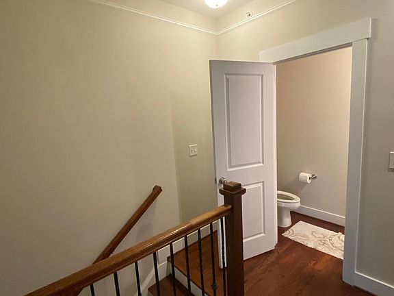 Half bath off kitchen and living room.