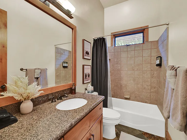 Full sized bathroom with tub
