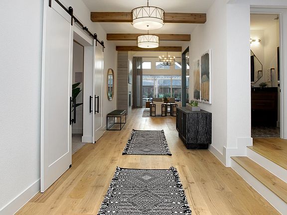 foyer with beam ceiling