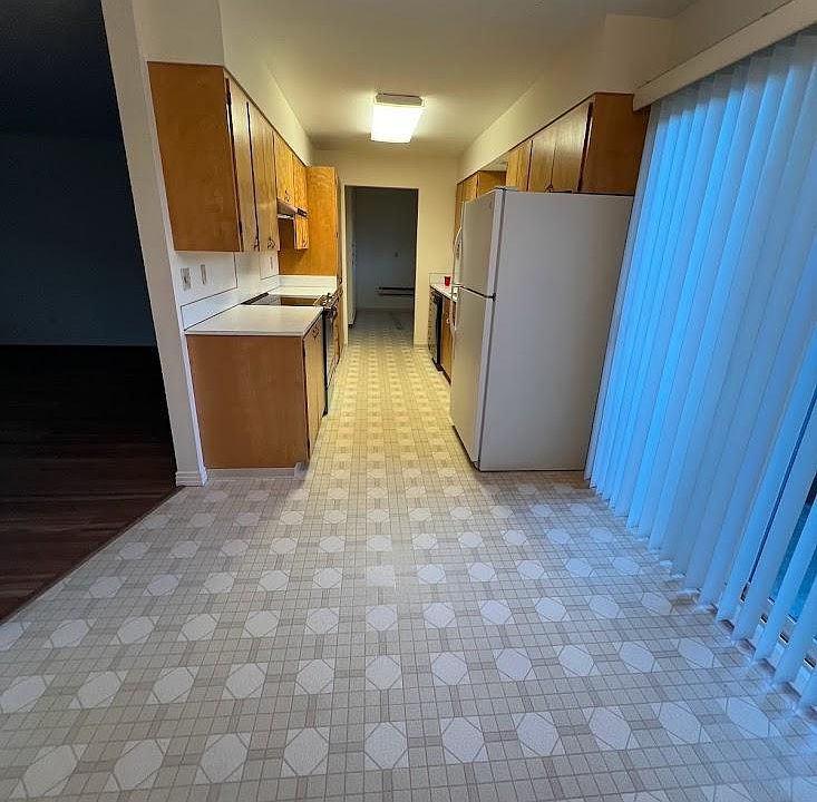 dining and kitchen,
new stove, dishwasher, refrigerator, utility room laundry and garage entry door