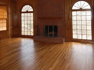 Beautiful two story wood paneled great room 
