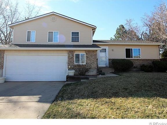 Front of house with 2 car garage