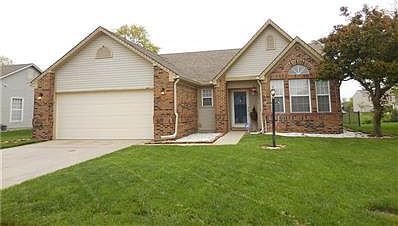 Front view of this cute home with lots of brick and vinyl siding for low maintenance
