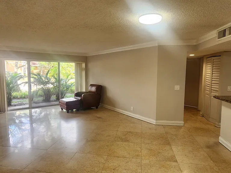 8871 Wiles Rd — Photo 2