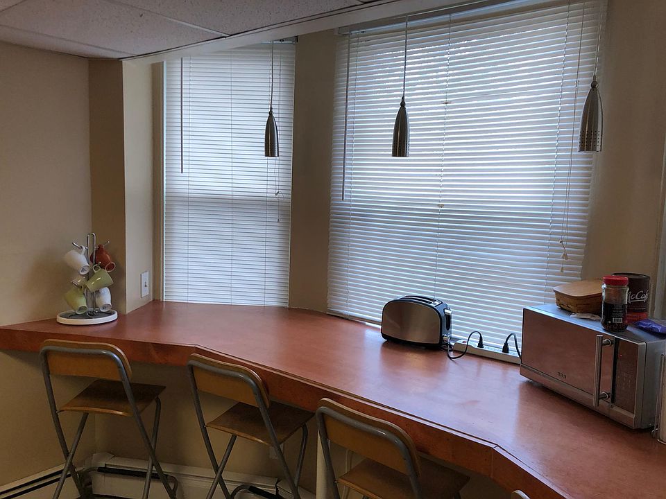 Spacious bay window with custom table (appliances and furniture not included, shown here for illustration purpose only)