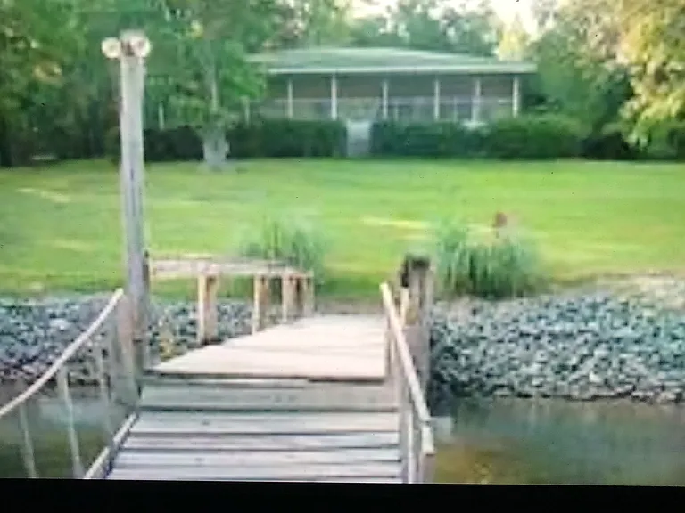 5221 Green Cove waterfront 4BR/2BA house, 1.03 ancre waterfront lot and private pier and dock on Lake Wylie, SC FSBO for $899,000.