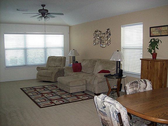 View of spacious living room as you walk in from entry area!