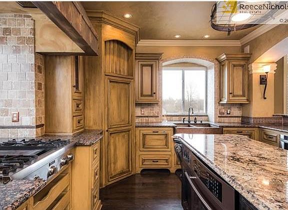 4 burner stainless steel cooktop with griddle is perfect for the chef in your family.  Kitchen also has a spacious walk in pantry.