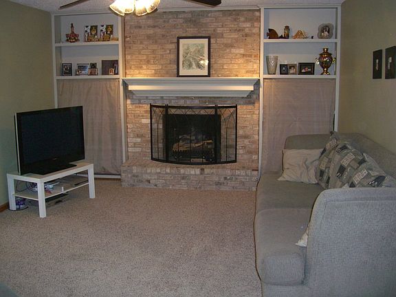 Fireplace has been converted to gas.