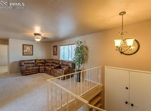 Large living area with mountain views out your front picture window.