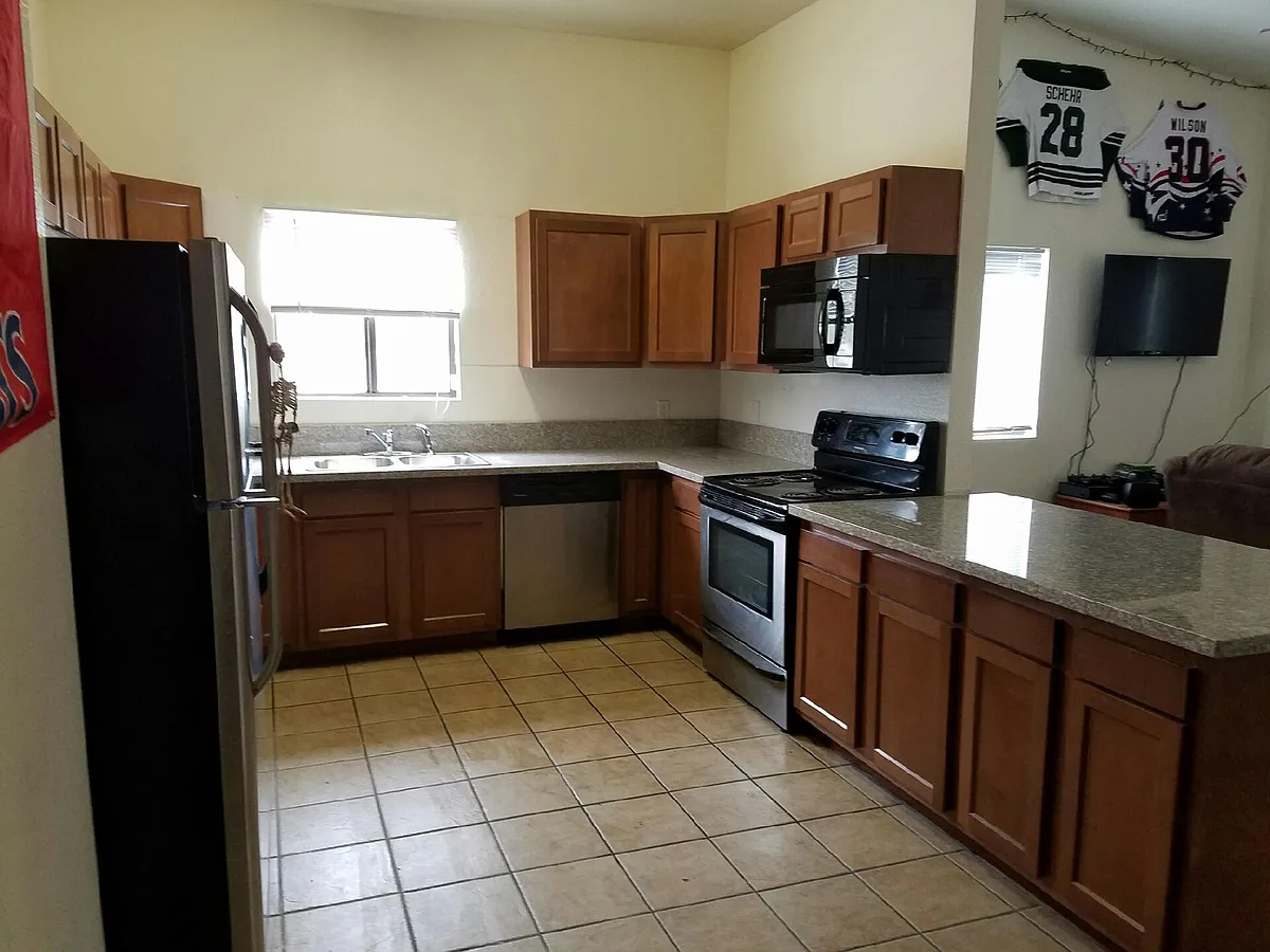 New kitchen (similar finishes) to be installed summer 2022 - 1823 N Park Ave #2