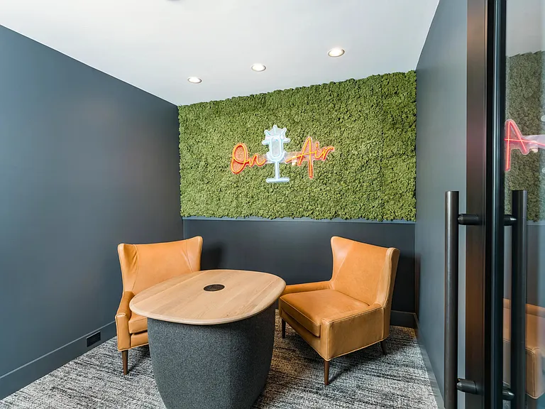 A polished podcast room perfect for content creation, client calls, or your next big idea_just press record and let inspiration flow.