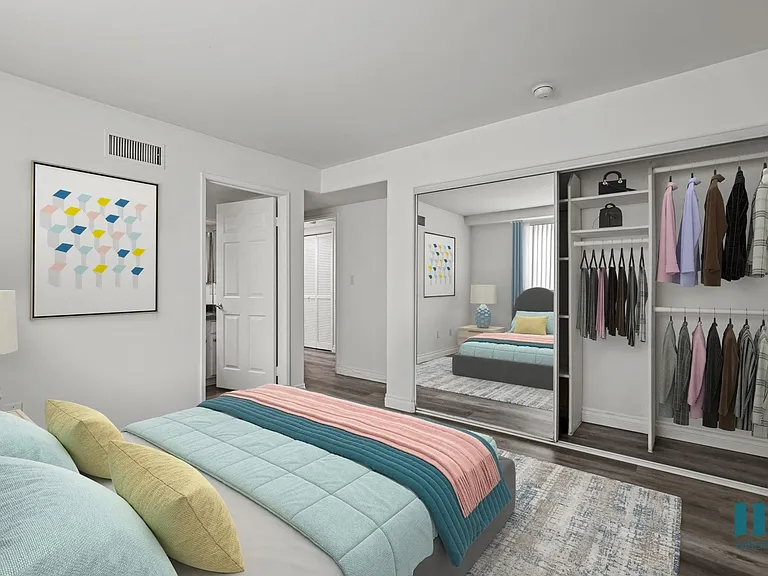 Bedroom with Mirrored Closet, Vinyl Flooring, and Bathroom