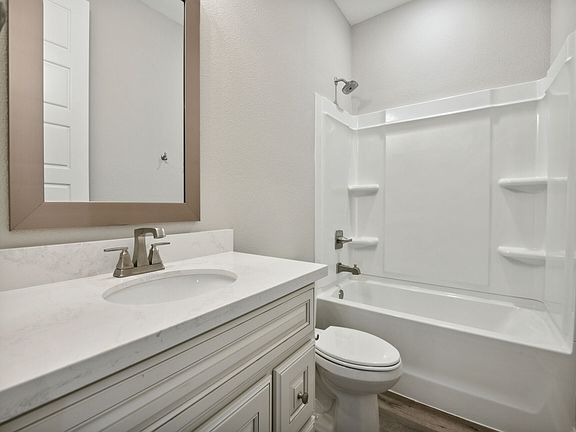 Secondary bathroom in the Dune floorplan at a Meritage Homes community in Gulfport, MS.