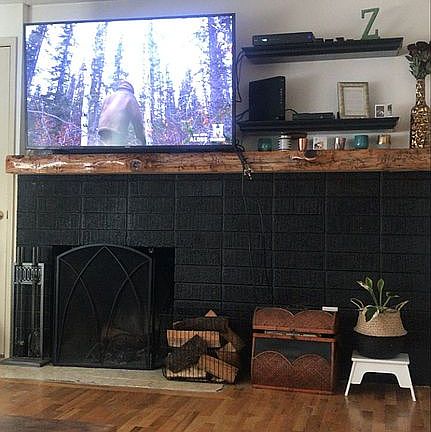 Living room w/ custom mantle