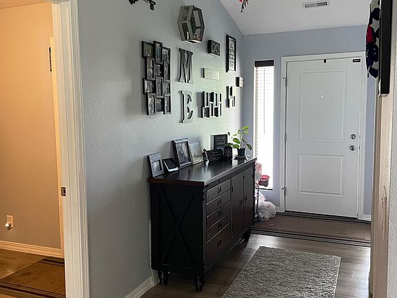 Entry, laundry room on left