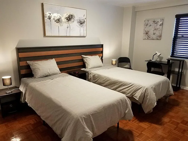 This photo shows the larger of the two bedrooms set up with two twin XL beds. (In both of the two bedrooms, you can have one king/queen bed, or two twin or twin-XL beds.)