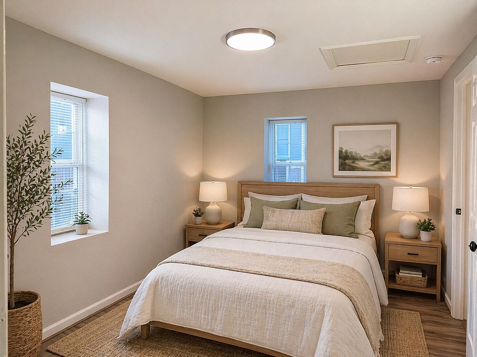 Quiet, well-sized bedroom with natural lightseparate from living space for added comfort and privacy.