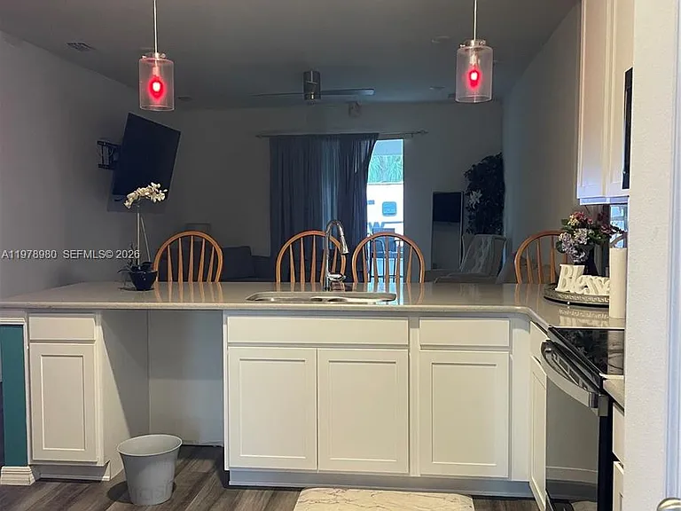 6157 NW Gatun Dr — Photo 8