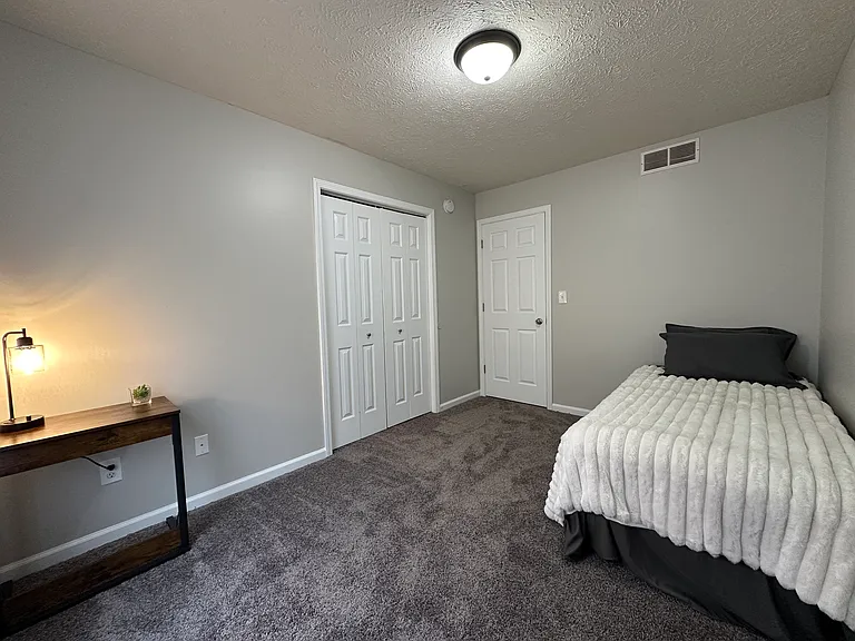 3-Bedroom Unit - Middle Bedroom - Freshly painted and updated carpet.