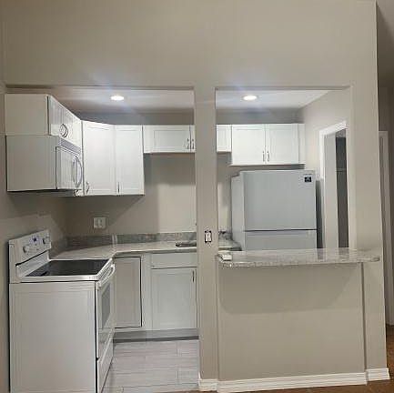 Studio kitchen with full size appliances (except dishwasher)