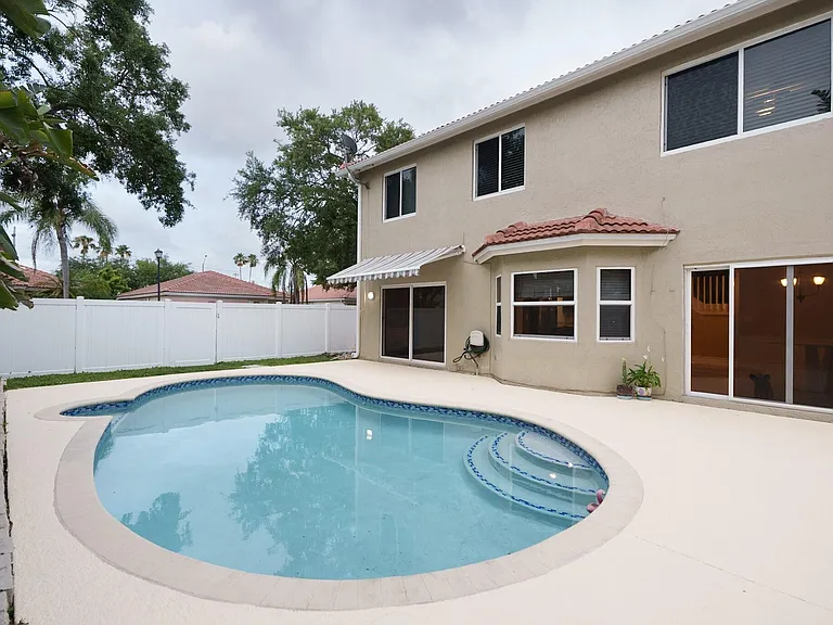 7251 NW 24th Ct — Photo 13