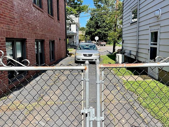 driveway w church wall on opposite side