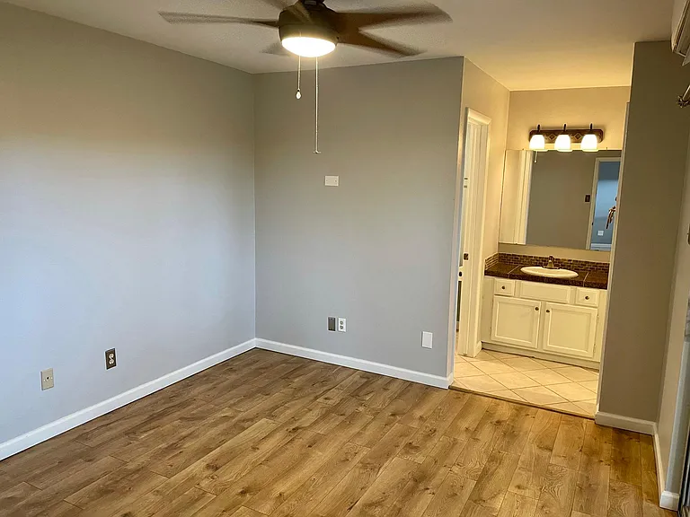 Master bedroom with private access to shower and toilet.