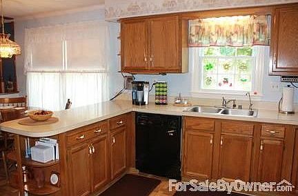 Kitchen
						:
						Kenmore dishwasher and Aqua Health water filtration system. Decorative shelves.