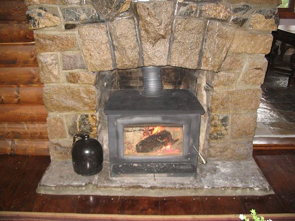 Original granite fireplace with insert!