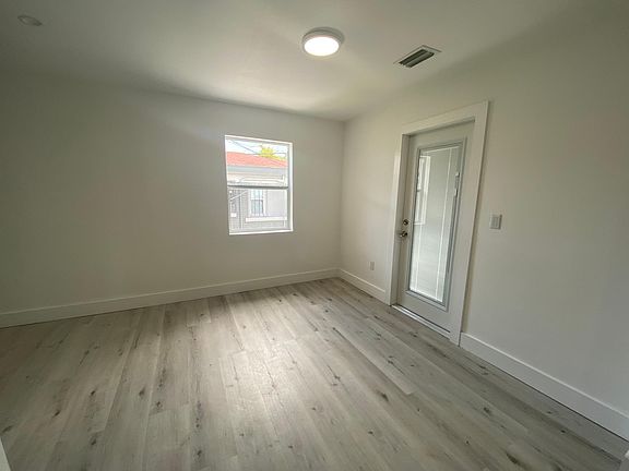 Dining space and door to backyard/terrace.