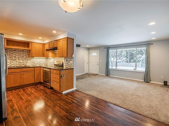 From the kitchen/dining area showing your living room. 