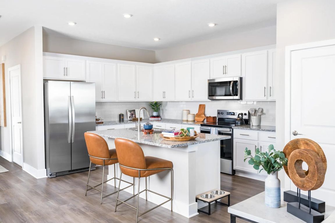 Gourmet kitchens with granite countertops offer a stylish and functional space for cooking and entertaining. Amenity image tile: Gourmet kitchens with quartz countertops