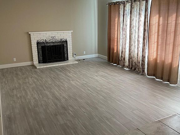 Living room with laminated wood floor