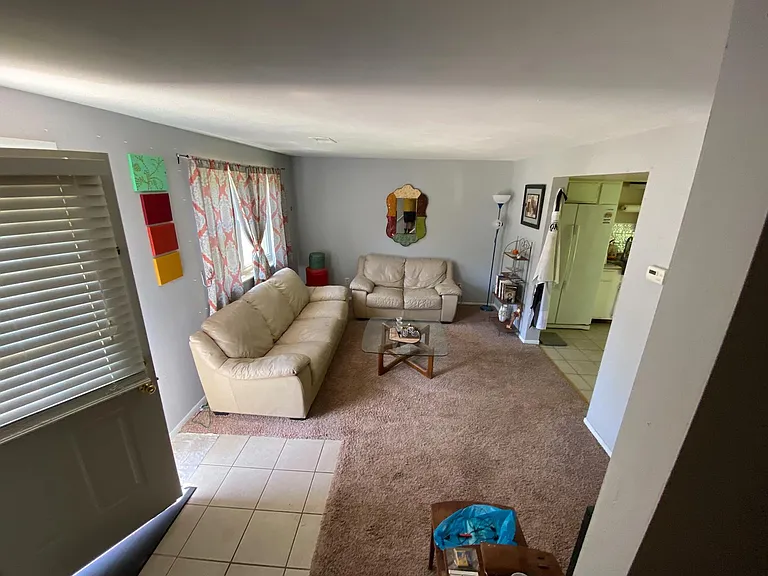 living room does not show new life proof plank flooring which is thruout house.