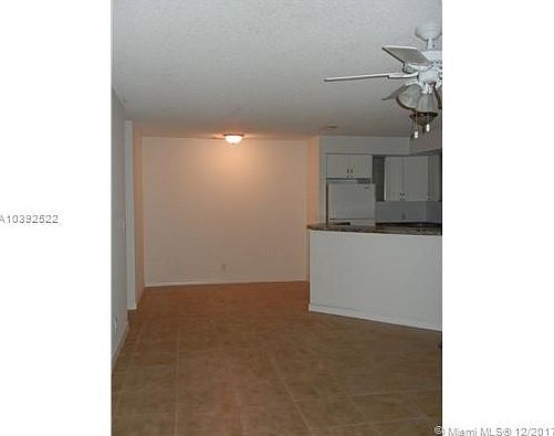 5th image of 3450 Pinewalk Dr N APT 411
