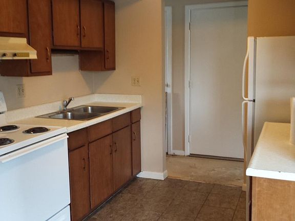 kitchen-cabinets have been painted white since this picture was taken