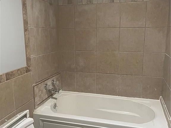 5th image of 8523 Troup Ave