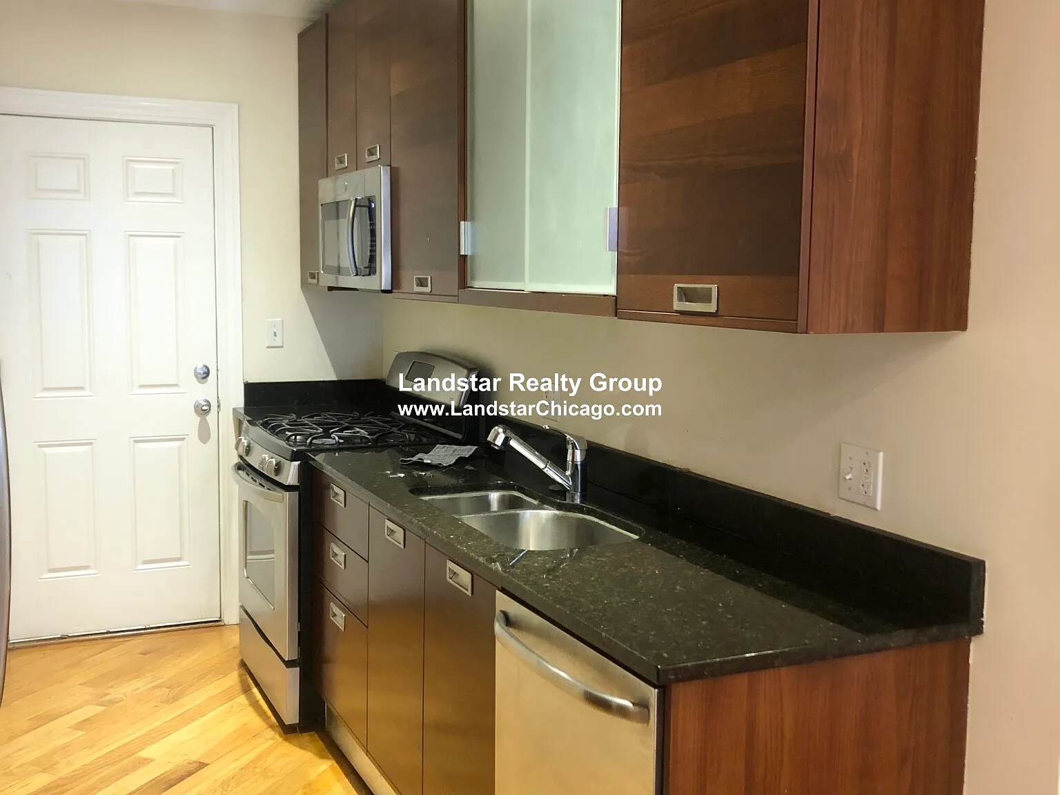 6937 N Oakley Ave — Photo 1