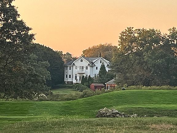 Nestled along a private lane with sweeping views of Hampshire Golf Course and incredible sunsets