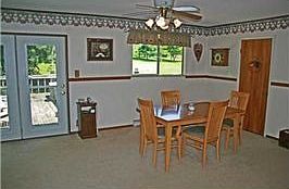 Eating area overlooks rear yard