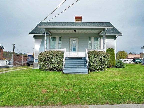 Nice front yard with inviting front porch.