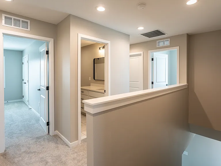 Main level living, upstairs features primary en suite and 2 additional bedrooms and full bath, plus full size washer/dryer and walk in laundry room.