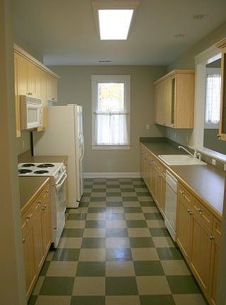 Kitchen boasts maple cabinets and Kenmore appliances-Refrigerator included!