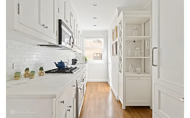 Sold by Douglas Elliman | media 18