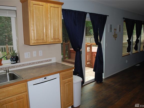 Lots of counter space and easy access to the back deck for those summer BBQs.