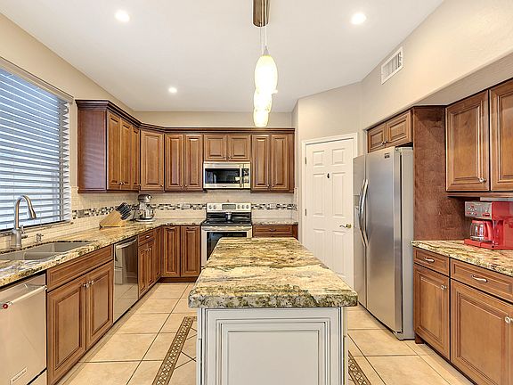 4th image of 9438 E Javelina Ave