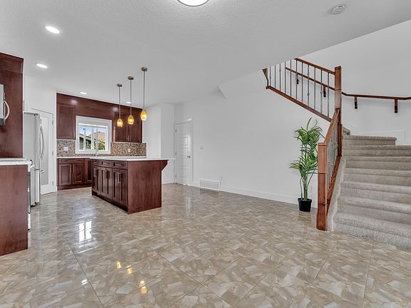 4th image of 6454 177a Ave NW