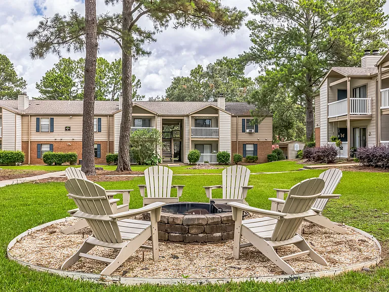 Gather around our outdoor fire pit with comfortable seating for cozy evenings with friends and neighbors, professionally operated by Highlands Vista Group.